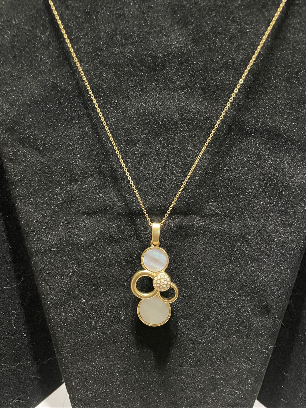 Gold-Tone Mother of Pearl Circle Pendant Necklace. M’s